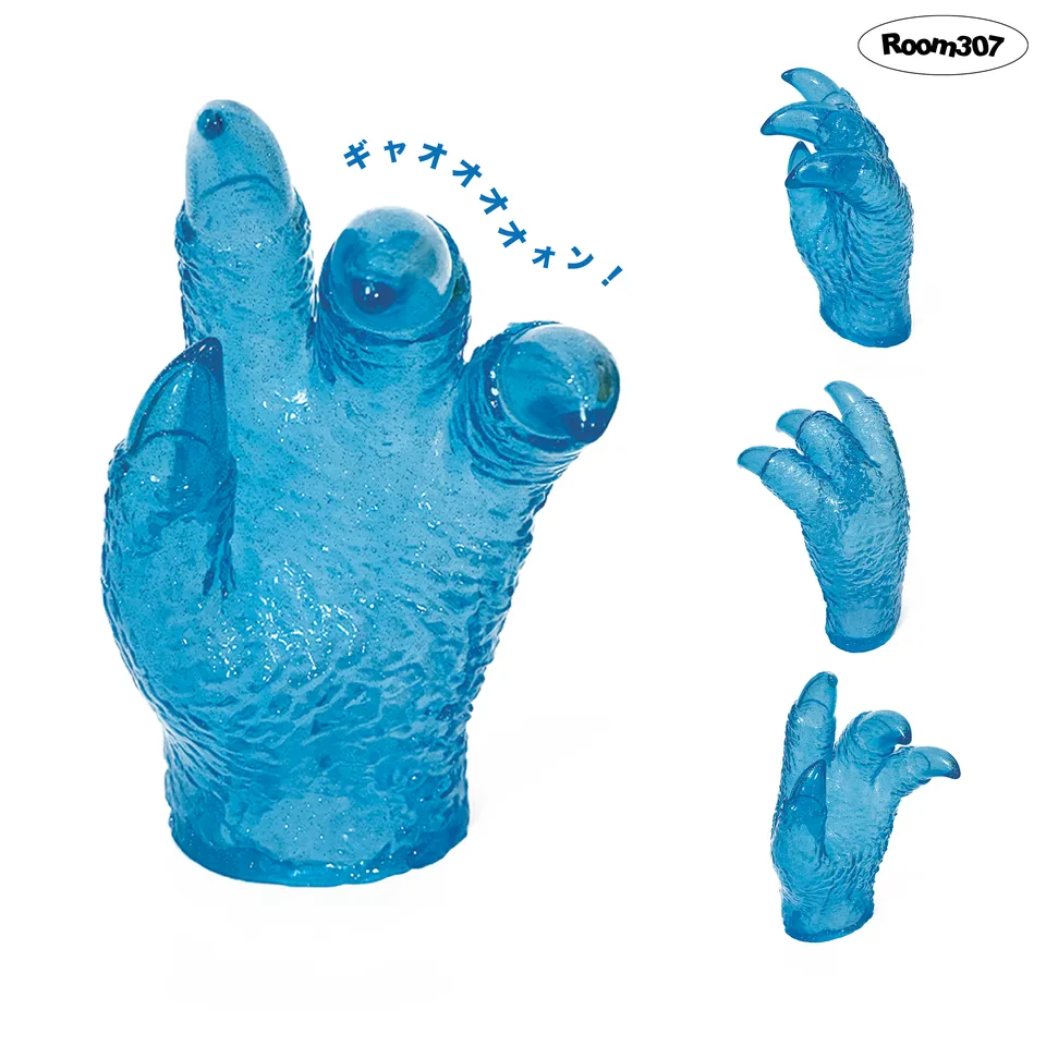 Detail view of the transparent blue Memory Boy art toy set.
