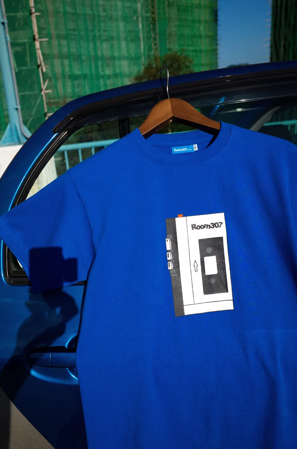 Alternate model view of the Room307 Cassette Player T-shirt.