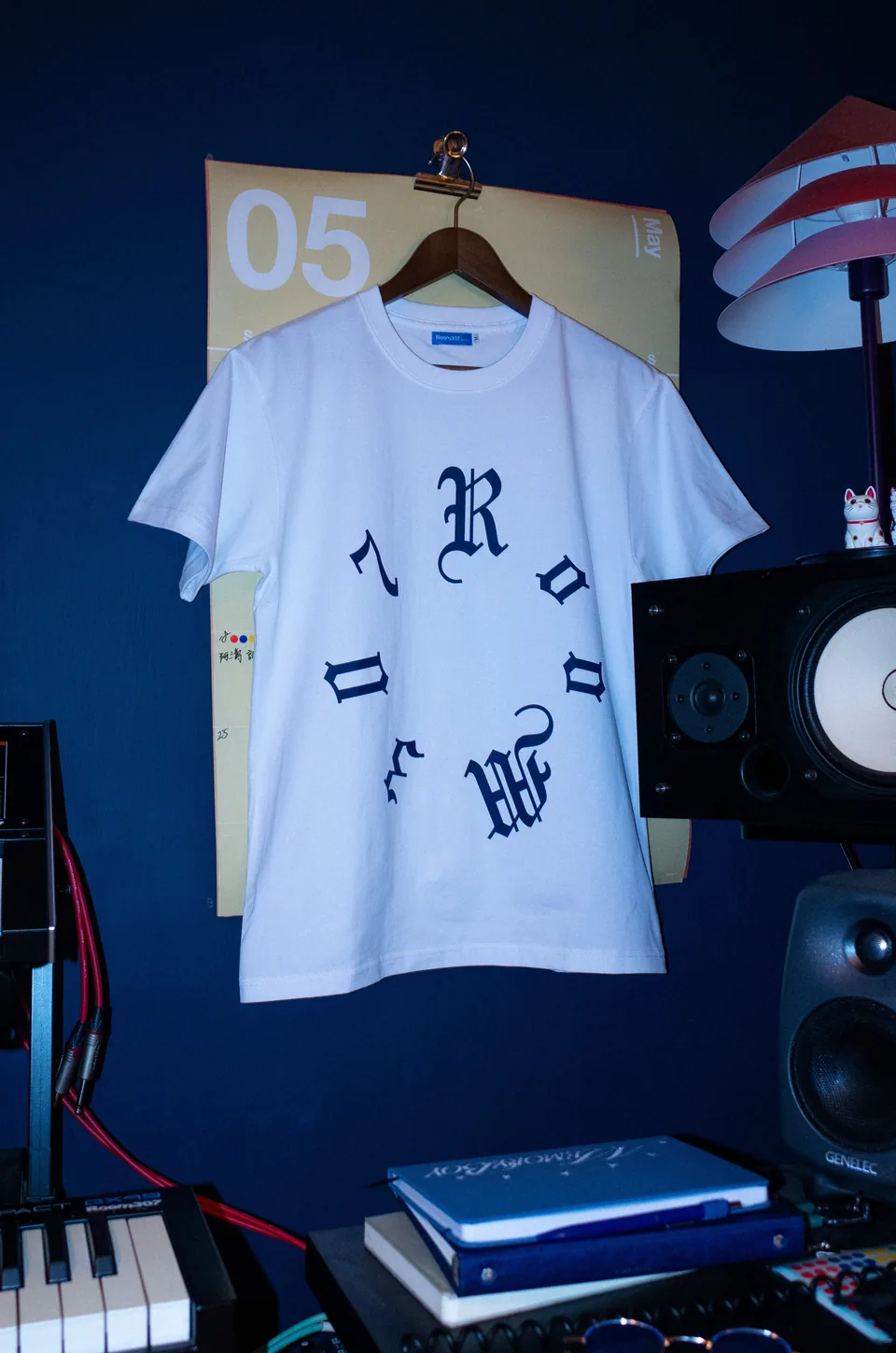 Model wearing the white Room307 logo T-shirt.